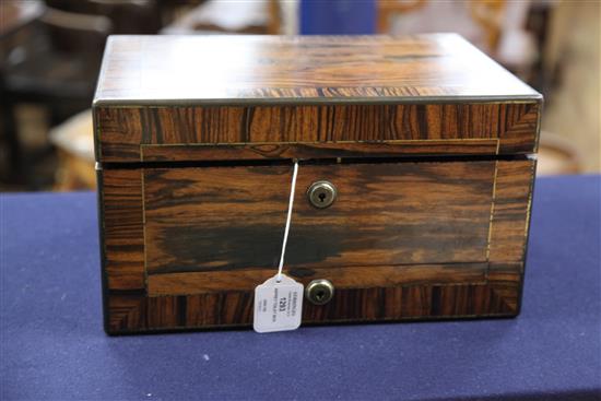 A Victorian brass inlaid rosewood travelling toilet box by Asprey containing ten engine turned silver mounted toilet jars,